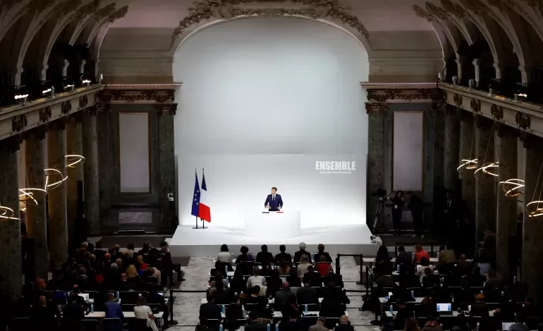 French President Emmanuel Macron speaks about the priorities of his Renaissance party and its allies before early legislative elections in Paris, France, on June 12, 2024 [Stephane Mahe/(Reuters]