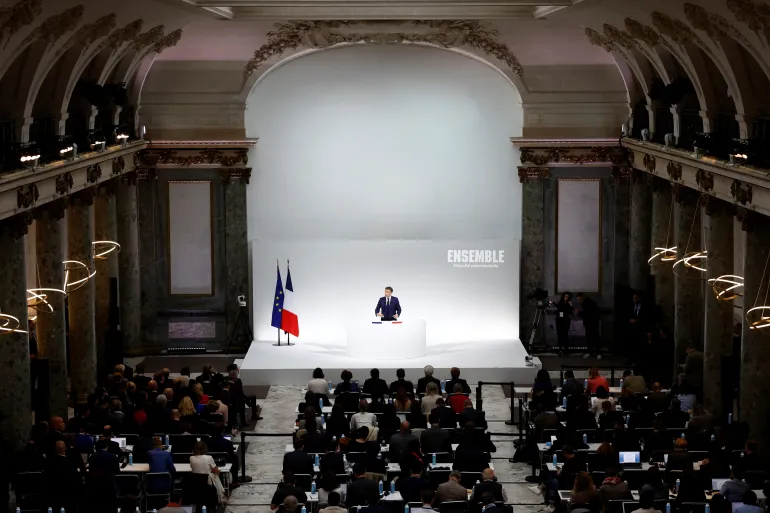 French President Emmanuel Macron speaks about the priorities of his Renaissance party and its allies before early legislative elections in Paris, France, on June 12, 2024 [Stephane Mahe/(Reuters]