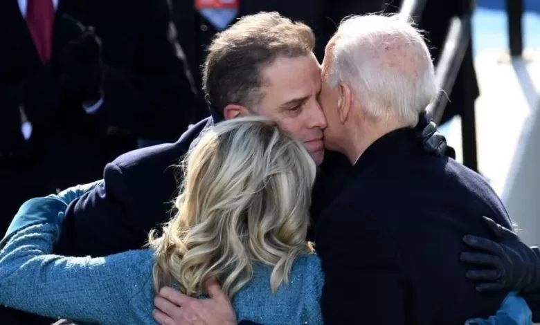 President Biden hugs his son, Hunter, and First Lady Jill Biden after his inauguration