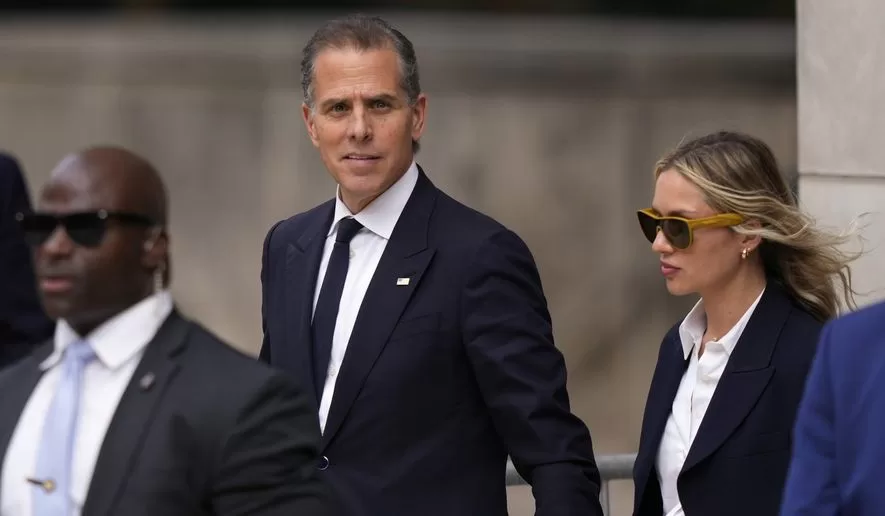 Hunter Biden, center, departs from federal court with his wife, Melissa Cohen Biden, right, Thursday, June 6, 2024, in Wilmington, Del.