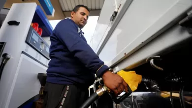 A worker fills a car's tank at a petrol station in Cairo, Egypt [File: Mohamed Abd El Ghany/Reuters]
