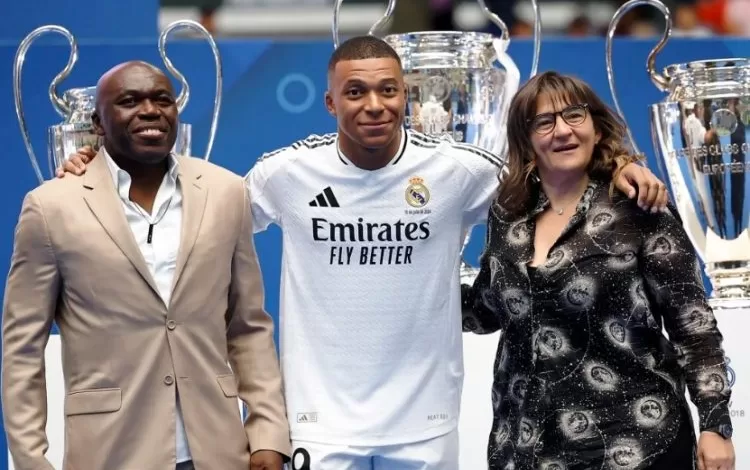 Kylian Mbappé with parents