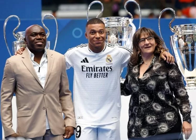 Kylian Mbappé with parents