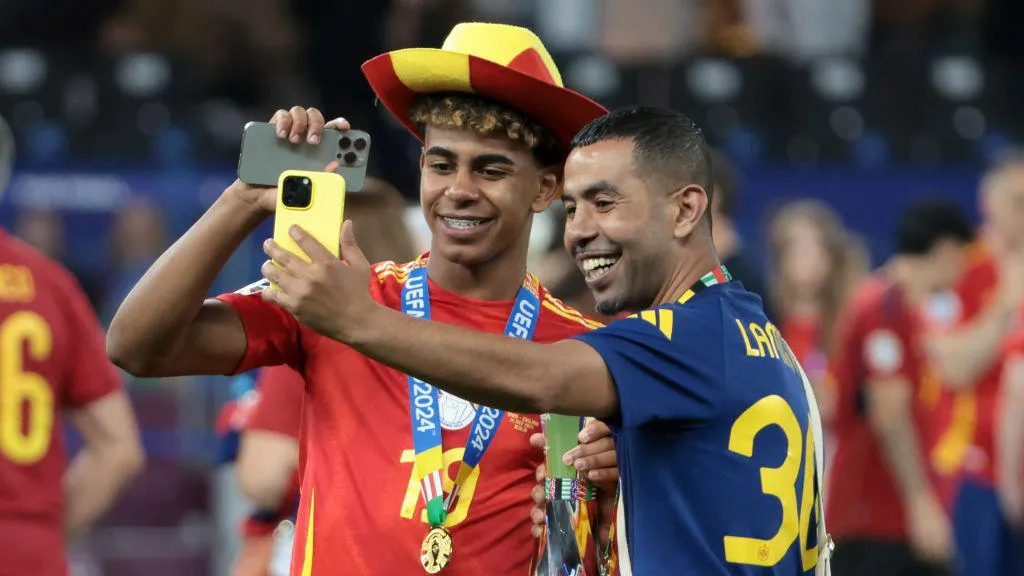 Mounir Nasraoui (right) watched on as his teenage son set up the opening goal in Spain's 2-1 win over England in this summer's Euro final