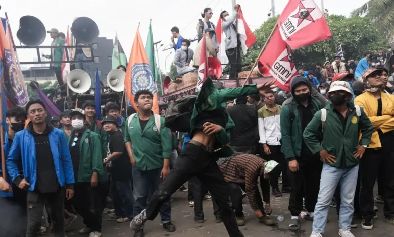 Protesters gather outside parliament in Jakarta