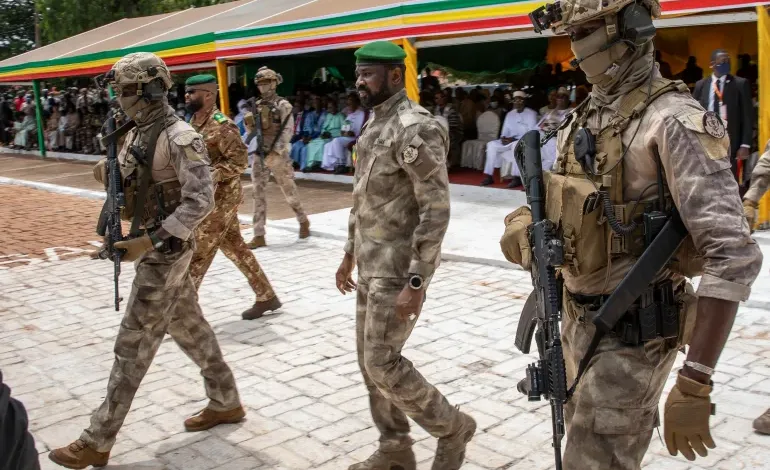 Lieutenant Colonel Assimi Goita (middle)