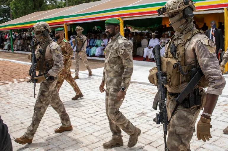 Lieutenant Colonel Assimi Goita (middle)