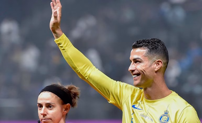 Al Nassr's Cristiano Ronaldo greets his fans during the Riyadh Season Cup 2024 final match