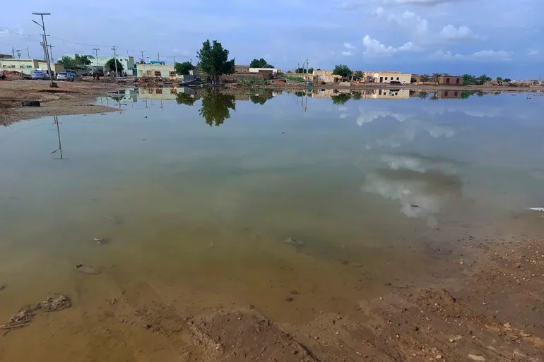 Floodwaters spread across a valley of Abu Hamdan