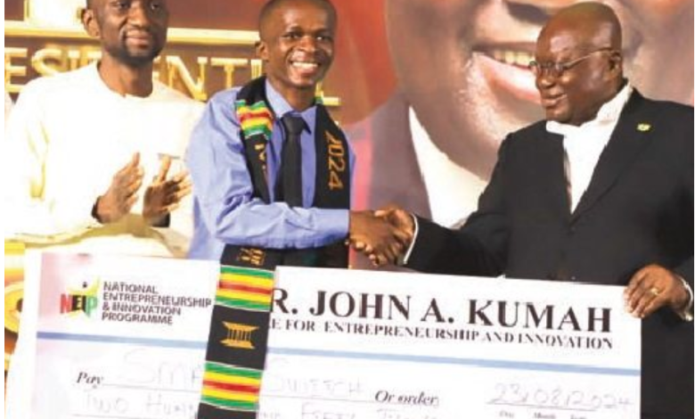 President Akufo Addo Presenting Prize Money To Samuel Naamgwinaa