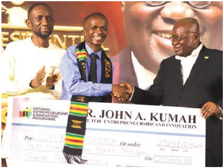 President Akufo Addo Presenting Prize Money To Samuel Naamgwinaa