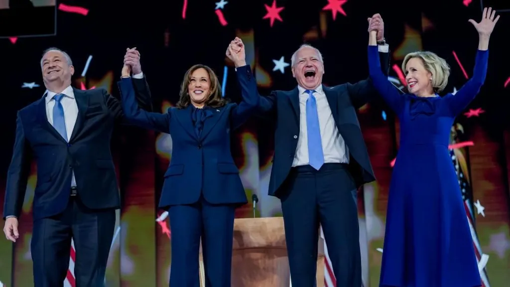 Harris was joined by husband Doug Emhoff (L), plus running mate Tim Walz (second R) and his wife Gwen Walz