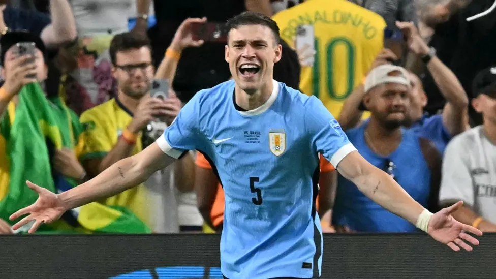 Manuel celebrates after scoring for Uruguay