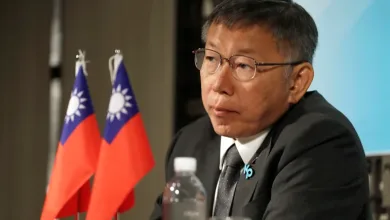 Taiwan People's Party presidential candidate Ko Wen-je listens during a news conference in Taipei