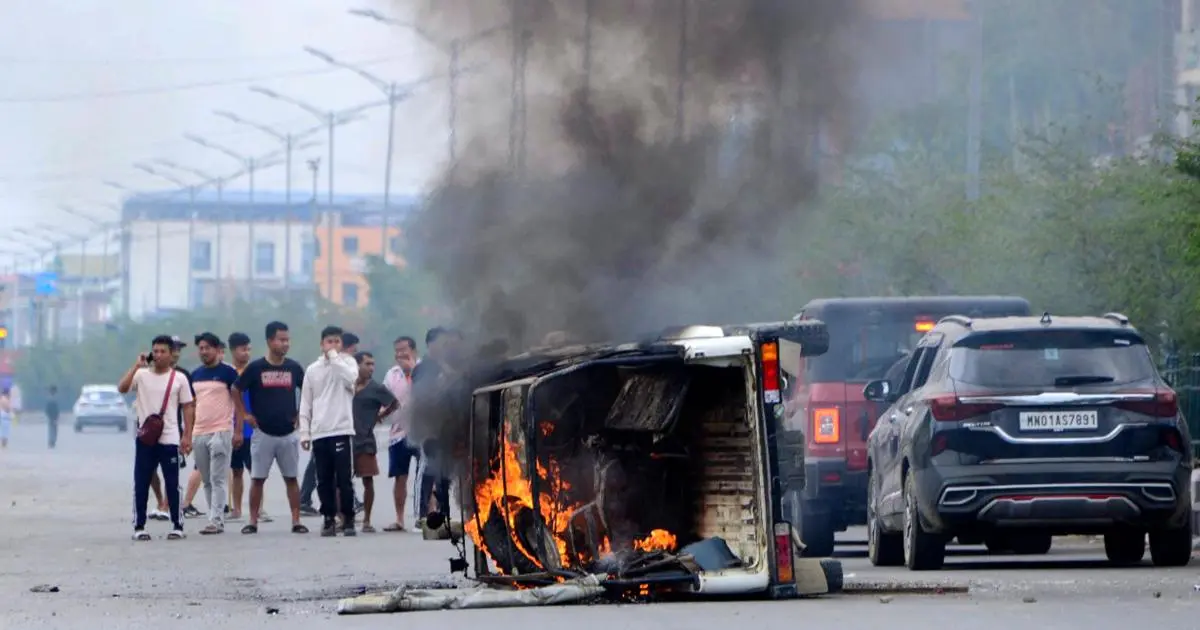 Burned vehicle in India Manipur violence