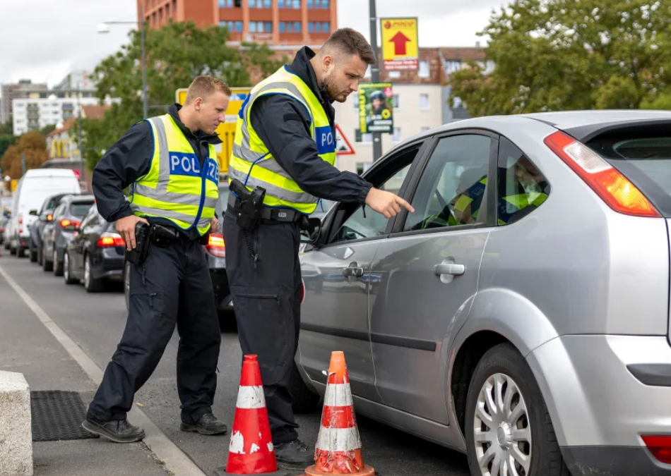 German federal police checking cars arriving at the German -Polish border