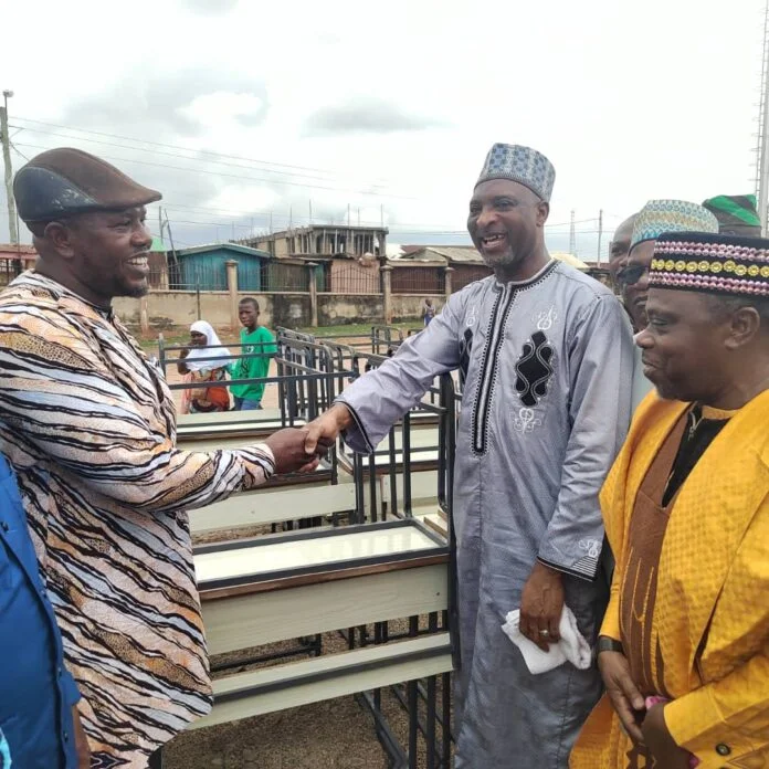 Hon. Muntaka donating chairs to Asawase schools