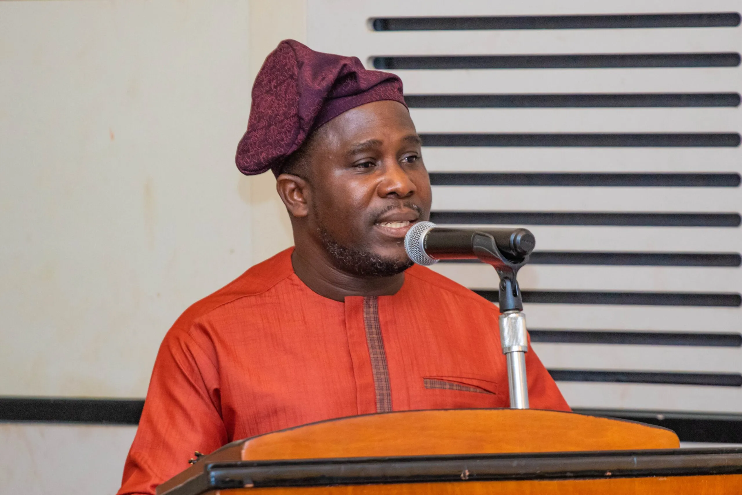 Nana Amoasi VII Executive Director of the IES delivering the welcome address scaled