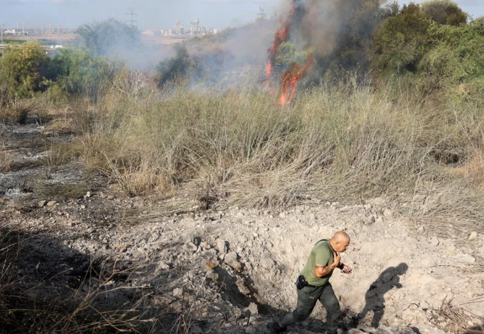 Smoke billows after a missile which the IDF says was launched from Yemen lands in central Israel