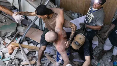 Ukrainian war victim and rescuers
