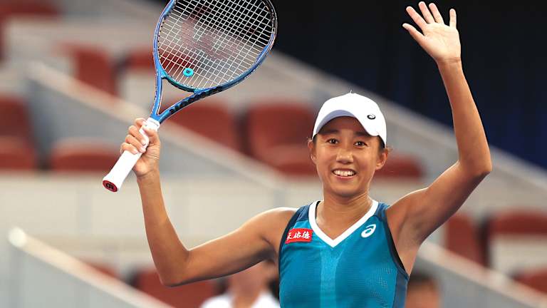 China's Zhang Shuai celebrates beating Magdalene Frech