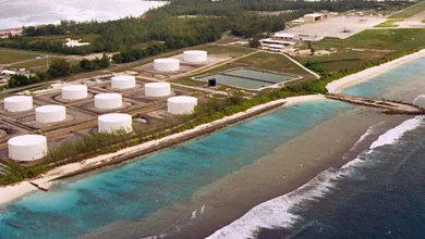 Fuel tanks at the edge of a military airstrip on Diego Garcia,the largest island in Chagos archipelago