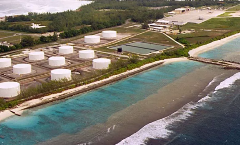 Fuel tanks at the edge of a military airstrip on Diego Garcia,the largest island in Chagos archipelago