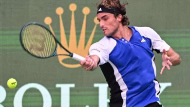 Greece's Stefanos Tsitsipas hit a return to Japan's Kei Nishikori during their match at the Shanghai masters