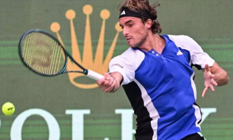 Greece's Stefanos Tsitsipas hit a return to Japan's Kei Nishikori during their match at the Shanghai masters