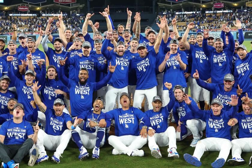 Los Angeles Dodgers players celebrating their win