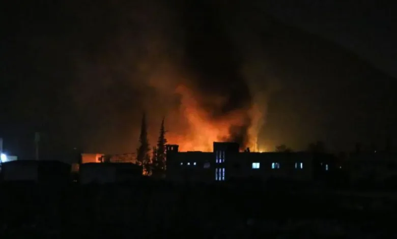 Smoke billows from a strike near Damascus on Monday night