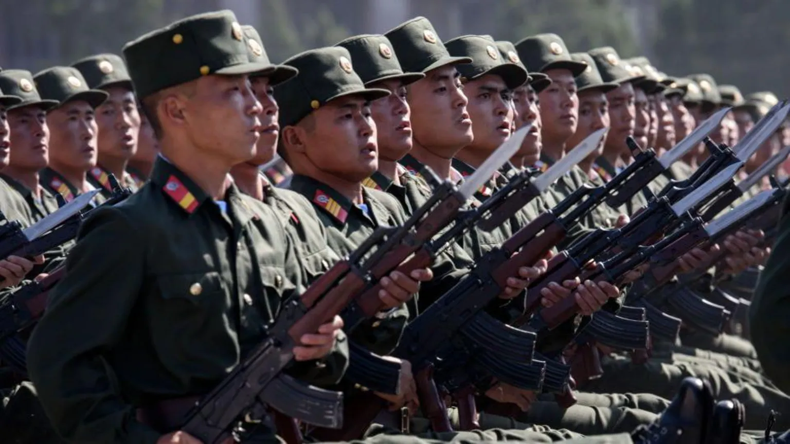 North Korean soldiers march during a mass rally in capital Pyongyang